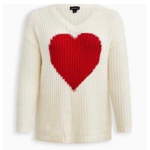 Warm knitted sweater, ' V- neck with heart design.